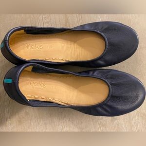 Brand new pair of navy tieks in a size 10